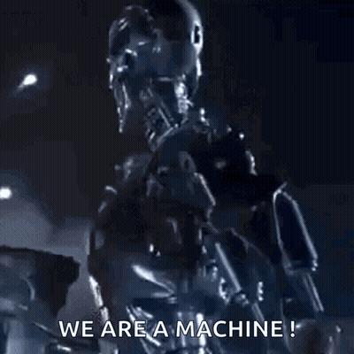 Robot Saying We Are A Machine In Purple Light GIF