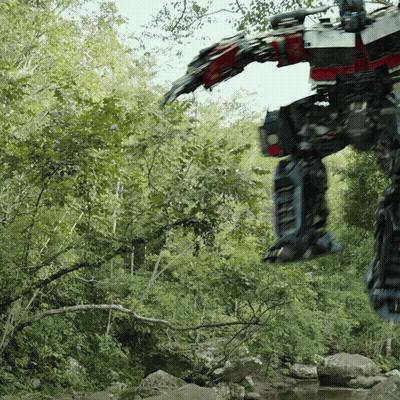 Robot Standing In Forest GIF