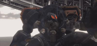 Robot Standing In Front Of Building In Video Game GIF