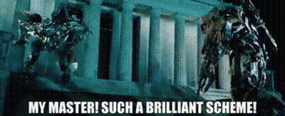 Robot Standing In Front Of Building Saying My Master Such A Brilliant Scheme GIF