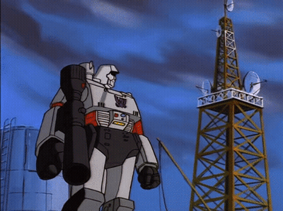 Robot Standing In Front Of Tower With Satellite Dishes GIF