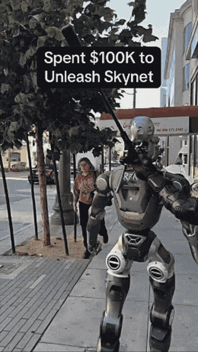Robot Walking Down Sidewalk Spent $100K To Unleash Skynet GIF