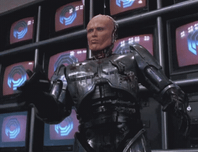 Robot Wearing Helmet And Mask Close Up GIF
