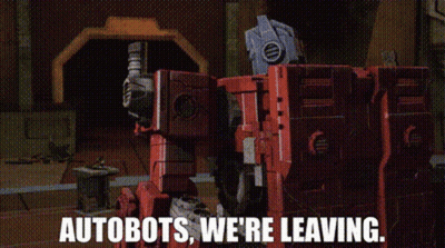 Robot With Autobots We're Leaving On Its Back GIF