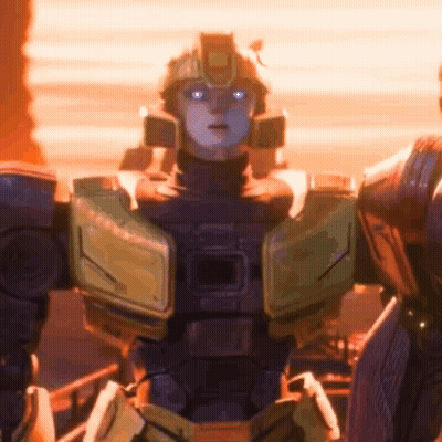 Robot With Blue Eyes And Helmet Next To Another Robot GIF