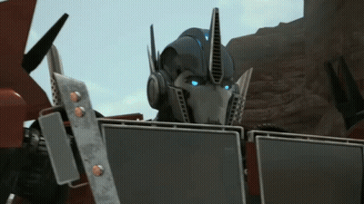 Robot With Blue Eyes And Shield GIF
