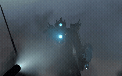 Robot With Blue Lights Standing In Fog GIF