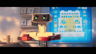 Robot With Green Eyes Standing In Front Of Monitor GIF