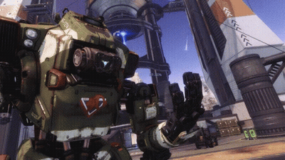 Robot With Heart On Chest Facing Building GIF