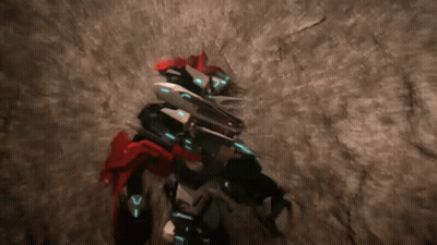 Robot With Letter V On Chest Standing In Cave GIF