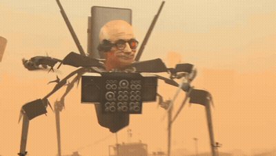 Robot With Man's Head And Glasses Holding Cell Phone GIF