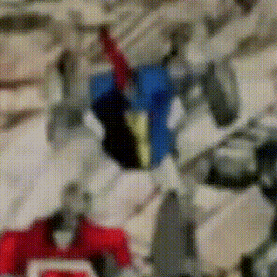 Robot With Red Blue Yellow Chest Stripe GIF