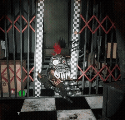 Robot With Red Mohawk Behind Bars GIF