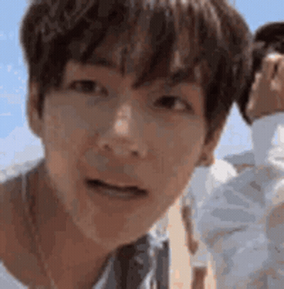 Robot With Sign Saying Hi Friend GIF