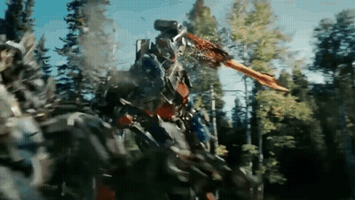 Robot With Sword Standing In Woods GIF