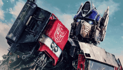 Robot With Transformer Logo On Chest GIF