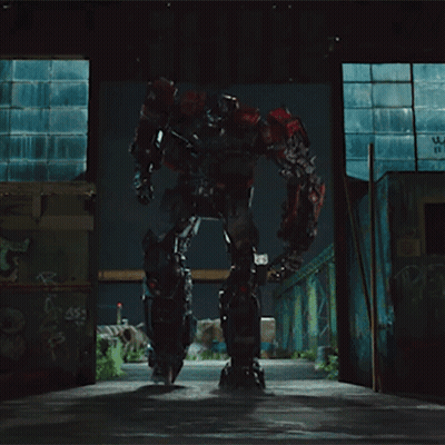 Robot With Transformers Logo Jumping GIF