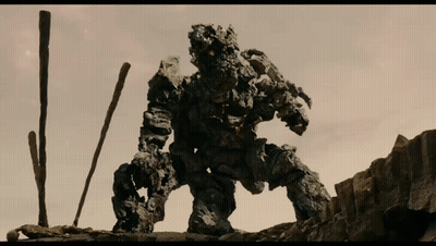 Rock Monster Statue On Hillside GIF