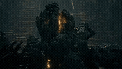 Rock Monster Statue On Rocky Hillside GIF