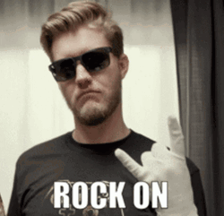 Rock On Gesture By A Man In Gloves GIF