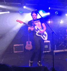 Rock Star Guitar Performance GIF