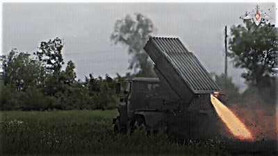 Rocket Launching From Military Vehicle In Field GIF