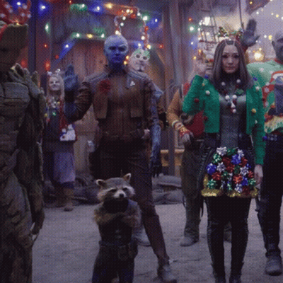Rocket Raccoon And Groot In Ugly Christmas Sweaters GIF