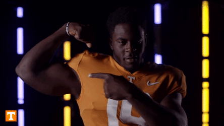 Rocky Top Football Player Flexing For Pose GIF