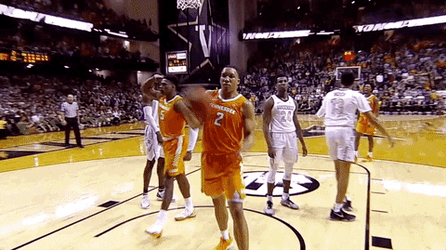 Rocky Top Player Flexing His Bicep GIF