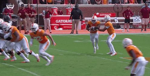 Rocky Top Player Running Through Opponents GIF