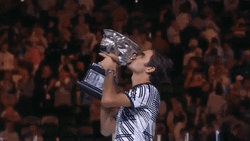 Roger Federer Kissing His Trophy