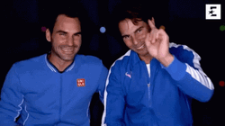 Roger Federer Pointing And Laughing
