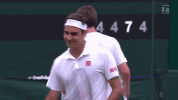 Roger Federer Raising His Arms