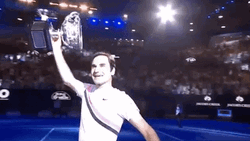 Roger Federer Showing His Trophy