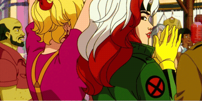 Rogue From The X-Men Stands Next To A Girl GIF