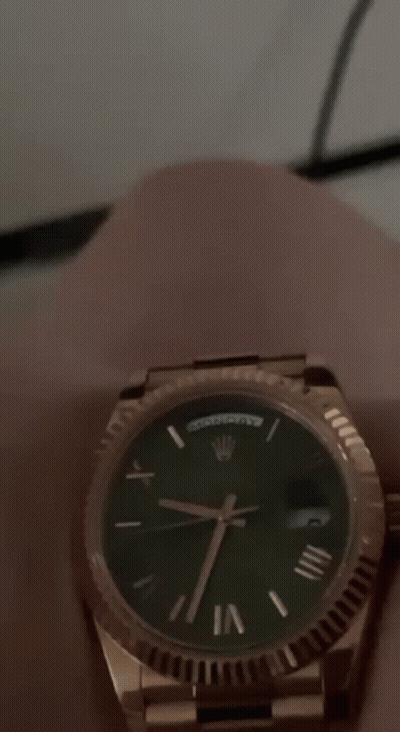 Rolex Watch With Green Face And Roman Numerals GIF