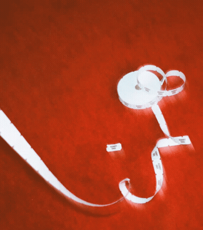 Roll Of Tickets Saying Admit One GIF