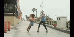 Roller Skating Couple Dancing GIF