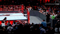 Roman Reigns Catches Chair GIF