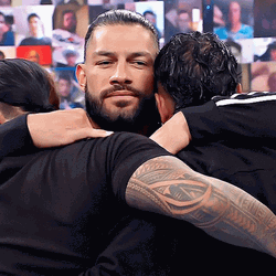 Roman Reigns Hugging GIF