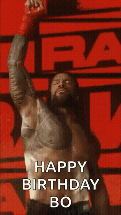 Roman Reigns In Red Glove Holding Microphone GIF