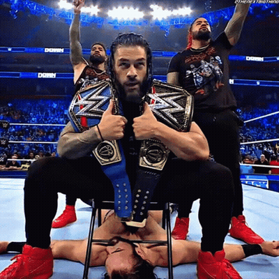 Roman Reigns Sitting With Wrestling Belt GIF