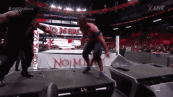 Roman Reigns Tackles John Cena GIF