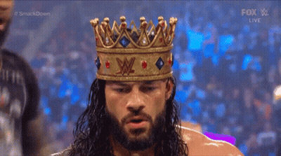 Roman Reigns Wearing Crown During Smackdown Match GIF
