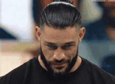 Roman Reigns With Beard And Bun GIF