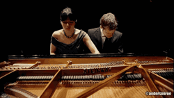 Romantic Couple Playing Piano GIF