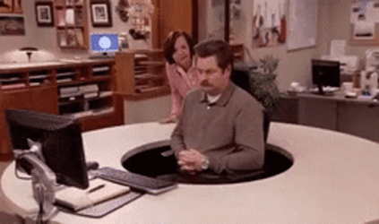 Ron Swanson Spinning In Front Of Computer GIF