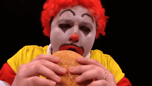 Ronald McDonald Eating Hamburger GIF