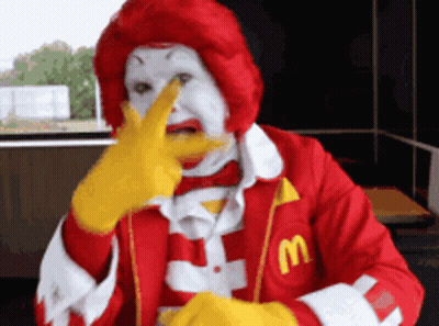Ronald McDonald Holding Finger To Nose GIF