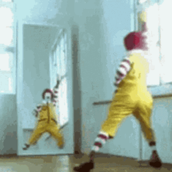 Ronald Mcdonalds Clown Posing At Mirror Funny  GIF